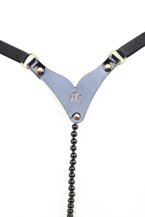 Lackleder String mit Perlen