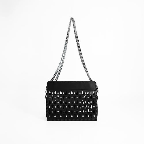 Leather handbag with rivets