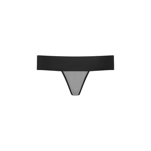 Leather look thong with tulle and ring of the O